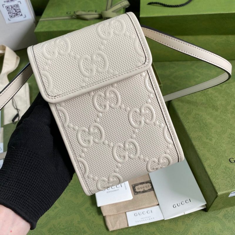 GUCCI GG Embossed Mini BagJOJOKKREPLICAS | High Quality Replica Watches & Bags