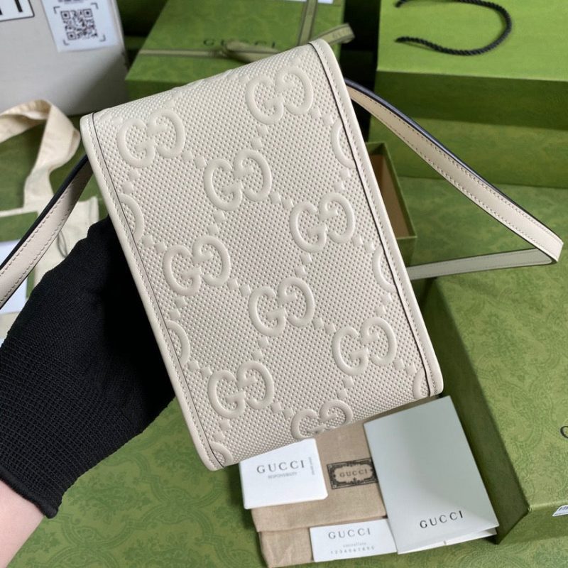 GUCCI GG Embossed Mini BagJOJOKKREPLICAS | High Quality Replica Watches & Bags