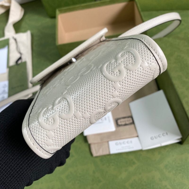GUCCI GG Embossed Mini BagJOJOKKREPLICAS | High Quality Replica Watches & Bags